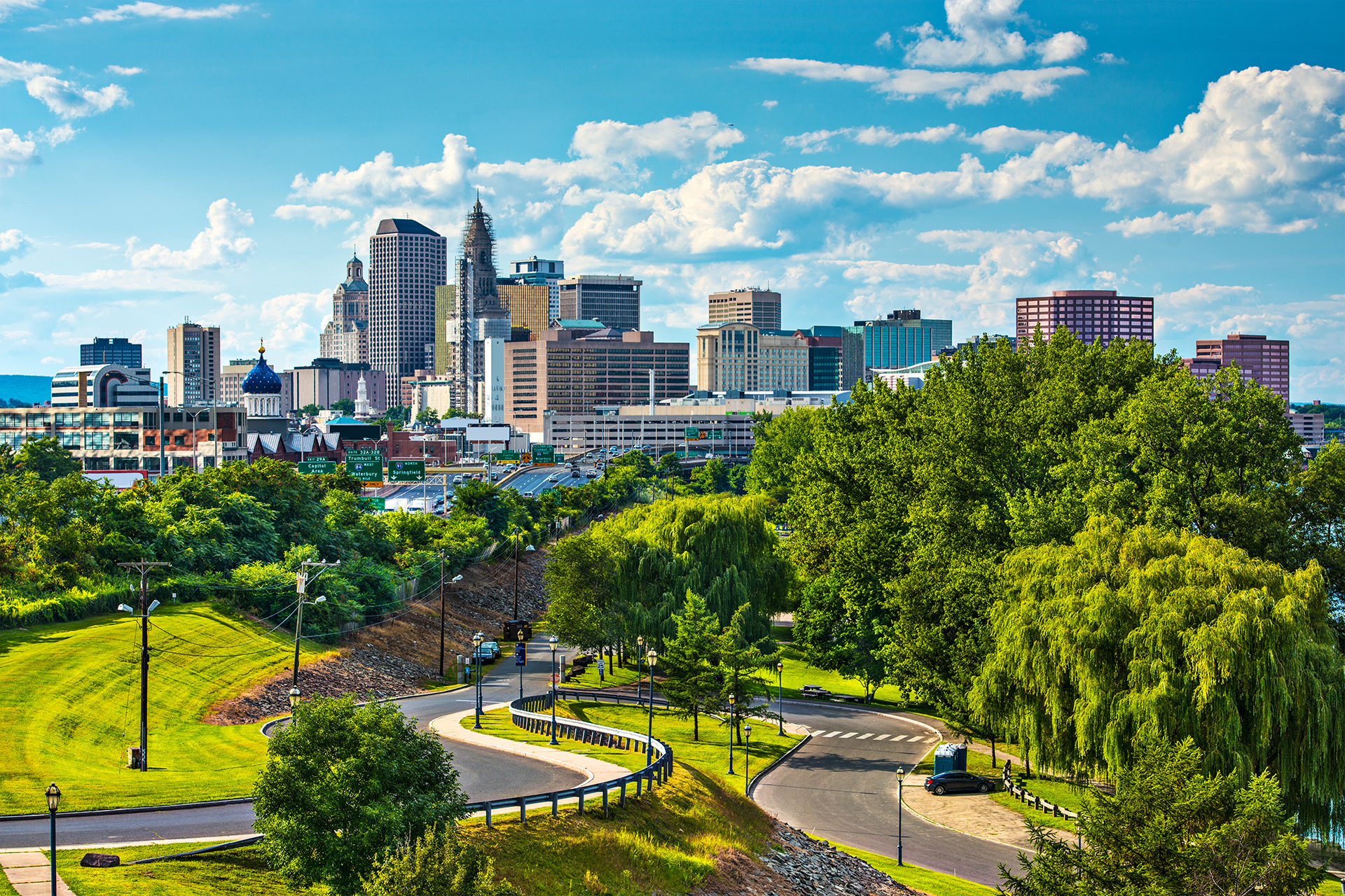 Skyline buildings with blue sky and clouds
